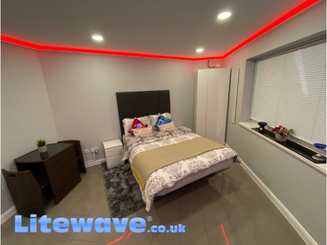 Wall Uplighting Kit in Bedroom - displaying Red